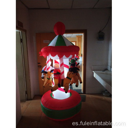 Carrusel giratorio inflable de felices fiestas para Navidad